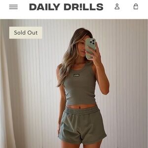 Daily Drills Set in DD Green
Resort shorts / Logo ribbed tank (both new in bag)